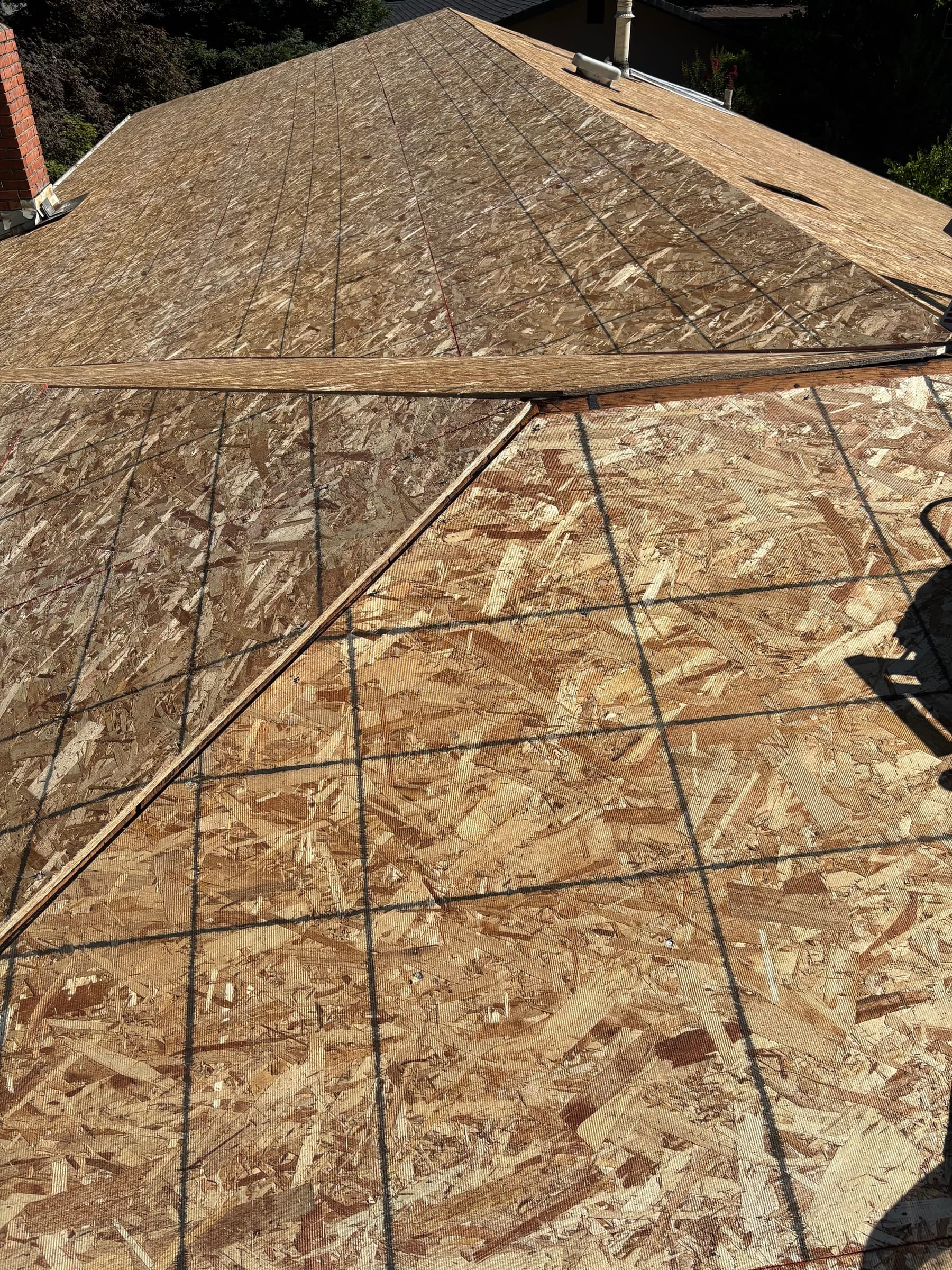 New OSB roof decking installed before the underlayment and shingles go on
